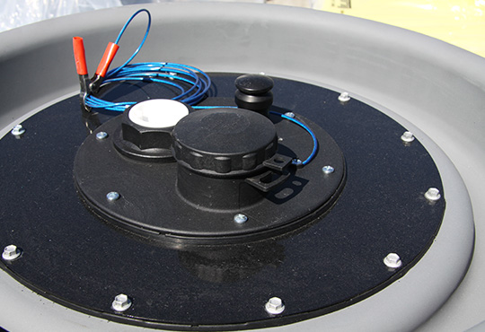 Multi-function 'No Spills Fill' tank lid system