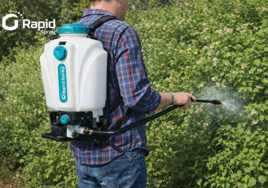 Spraying Lantana with a backpack Sprayer